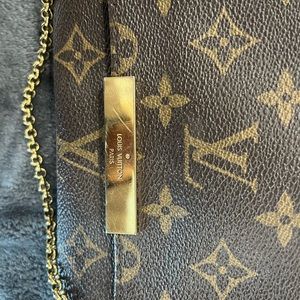 Authentic LV Pouchette good condition with box and receipt